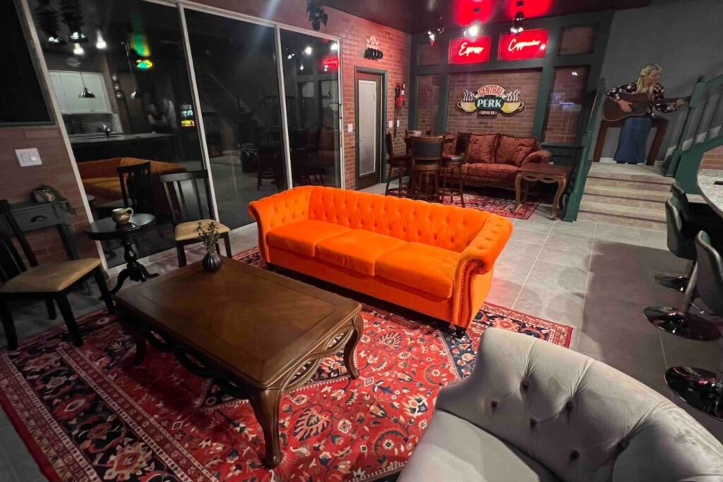 Amazing Friends — Living room with orange sofa