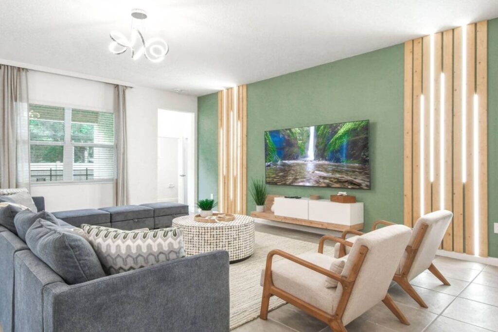 Bella Vida · 12-bedroom home — Living room overlooking the patio