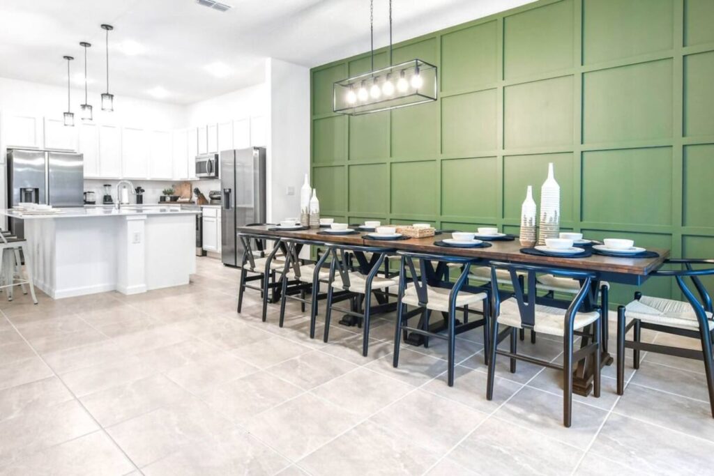 Bella Vida · 12-bedroom home — Long dining tables beside the kitchen